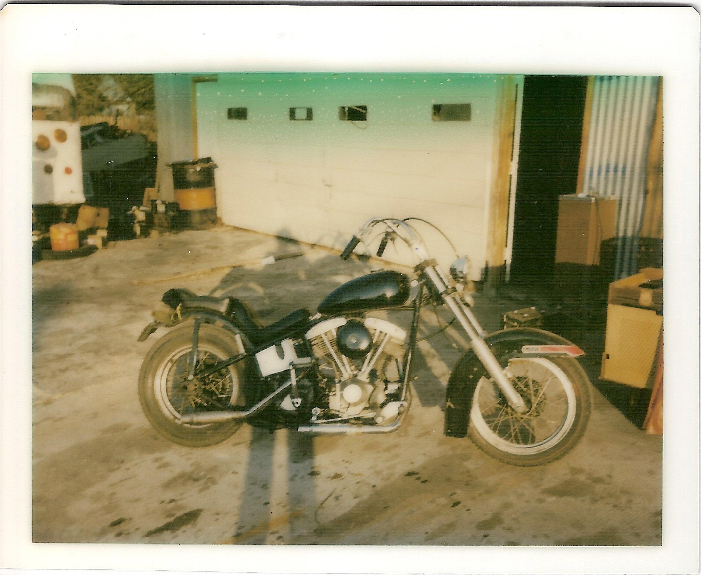 Bud's 1980 (12-80) facing ENE w. original tin shop, school bus used for swap meets at left (courtesy Bill James)